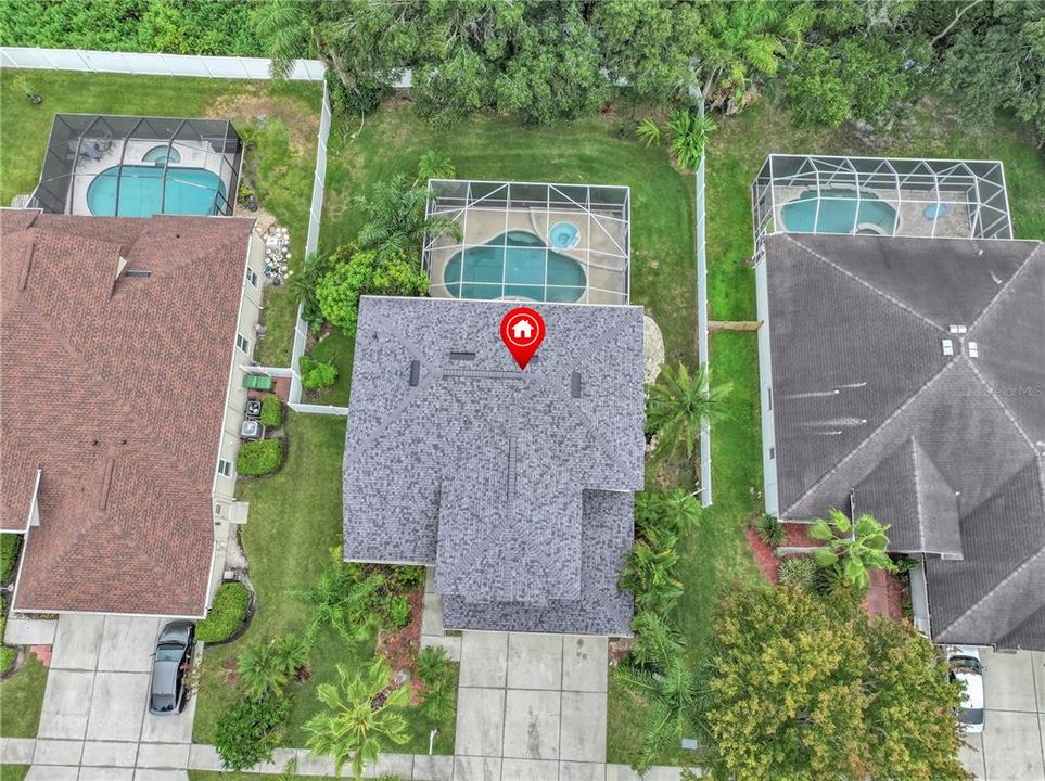 DRONE OVERHEAD SHOWING TOTAL LENGTH OF PROPERTY FROM DRIVEWAY TO BACK FENCING