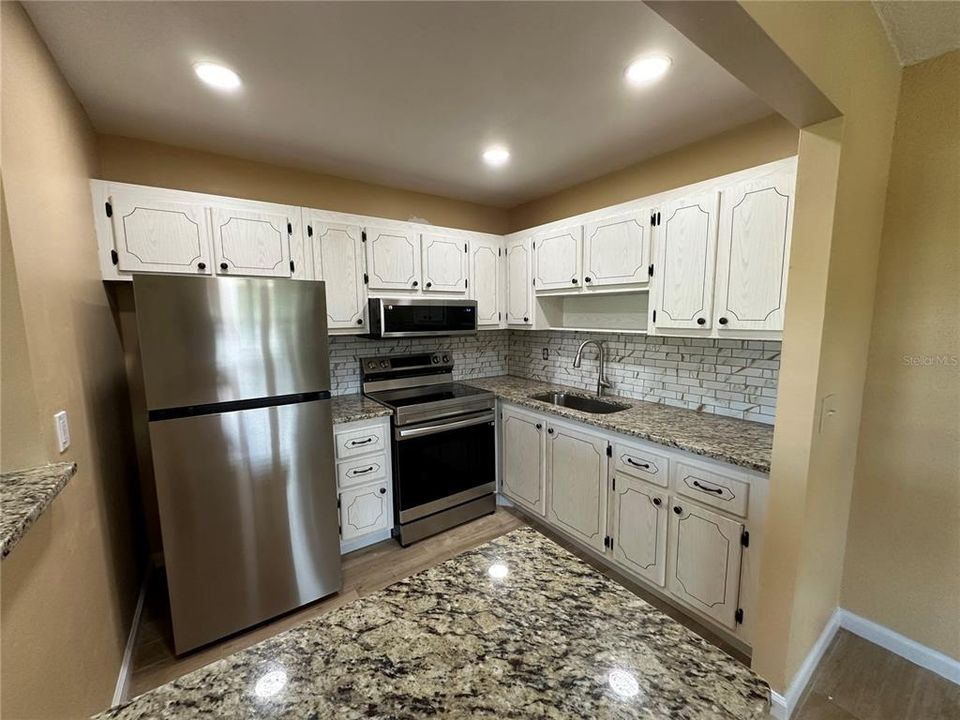 Large kitchen with new appliances