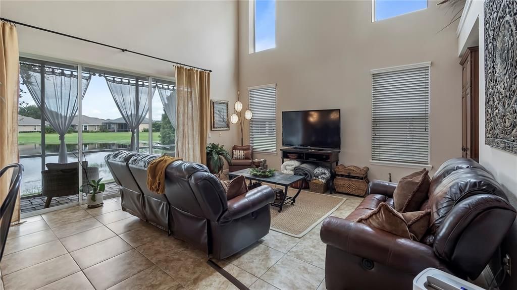 Living Room and Back Yard w/ Pond View