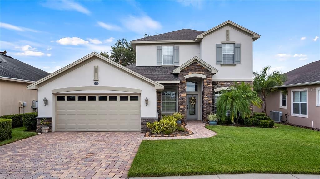 Front of Home with Paver Driveway and Walkway