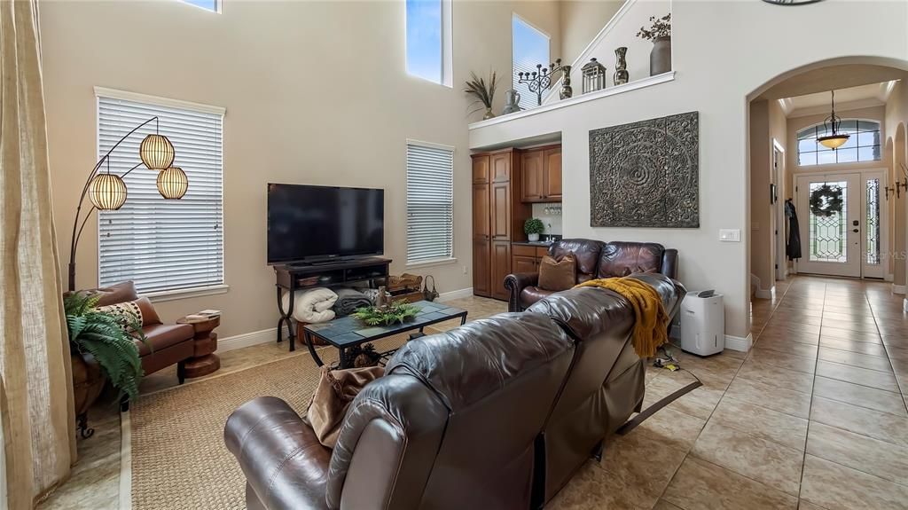 Living Room w/ Dry Bar and Hidden Room under stairs