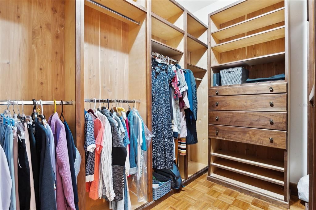 Walk-in closet in primary bedroom