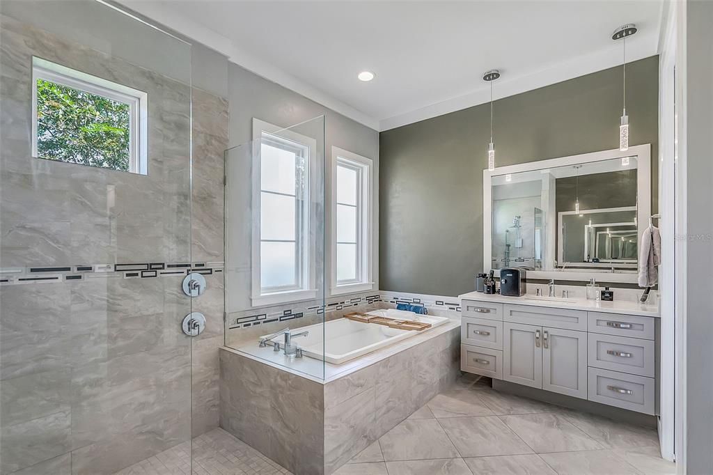 Owners bathroom with soaking tub and walk in shower