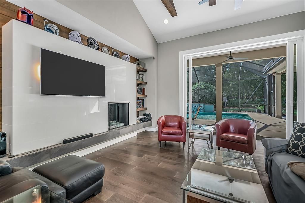 Living room with double sliders opening to pool area