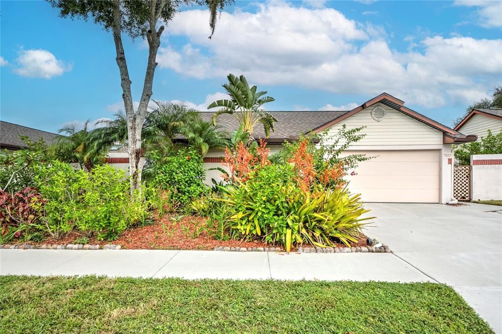 FRONT OF HOME WITH AMAZING LANDSCAPE