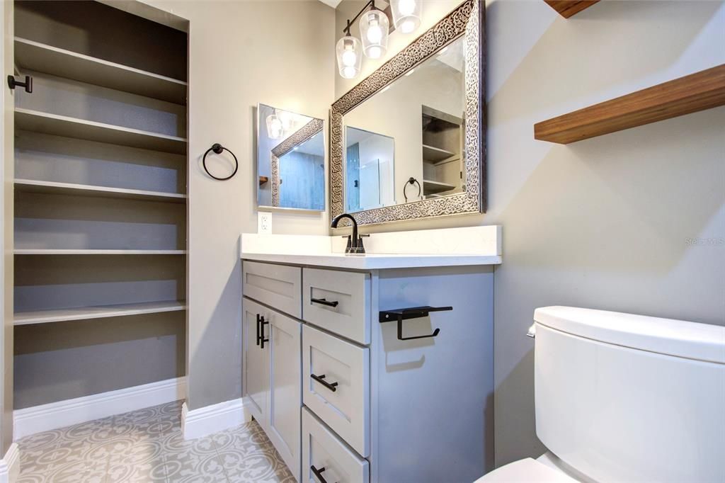 FROM SHOWER LOOKING AT SINKS AREA AND CLOSET