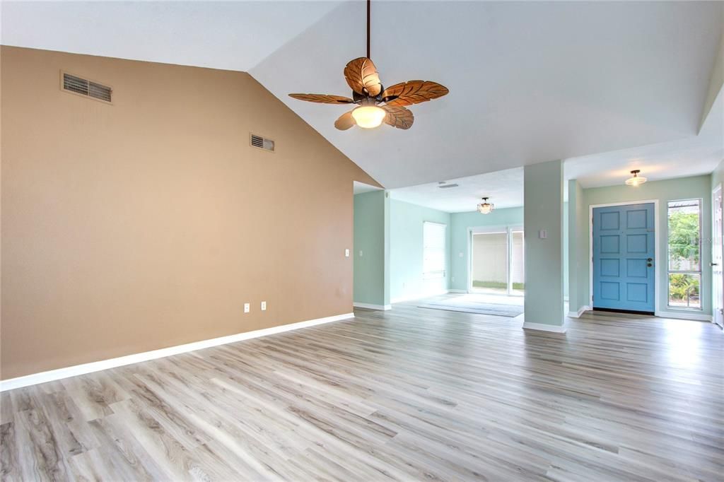 GREAT ROOM LOOKING TO FRONT DOOR AND DINING ROOM