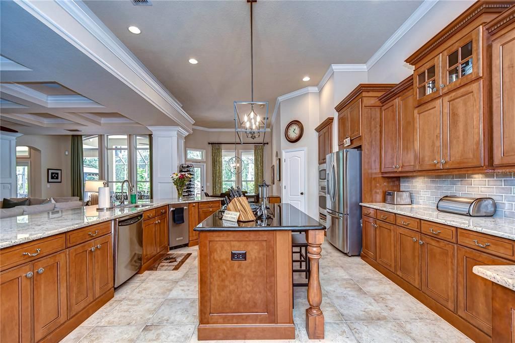 Stunning kitchen with 42” maple cabinetry with dentil crown molding!