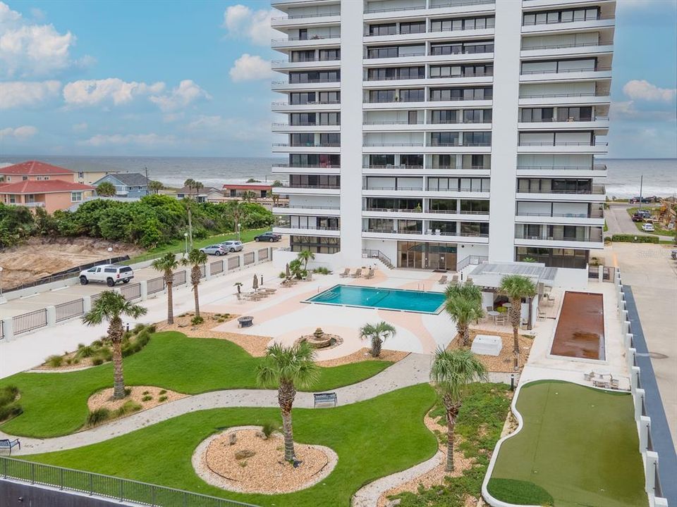 Aliki Outdoor Amenities include pool, outdoor kitchen and recreational space including putting green and shuffleboard