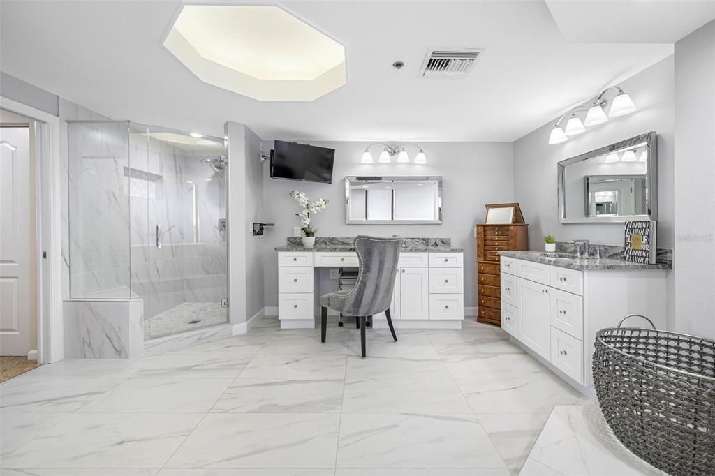 Marble walk in shower, double vanities