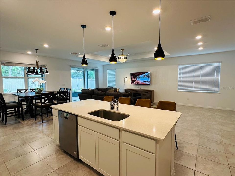 Comfortable breakfast bar with quartz countertop