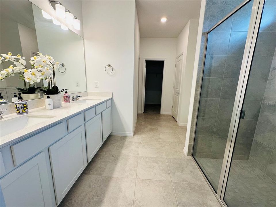 Master Bathroom with double sink and walk in shower