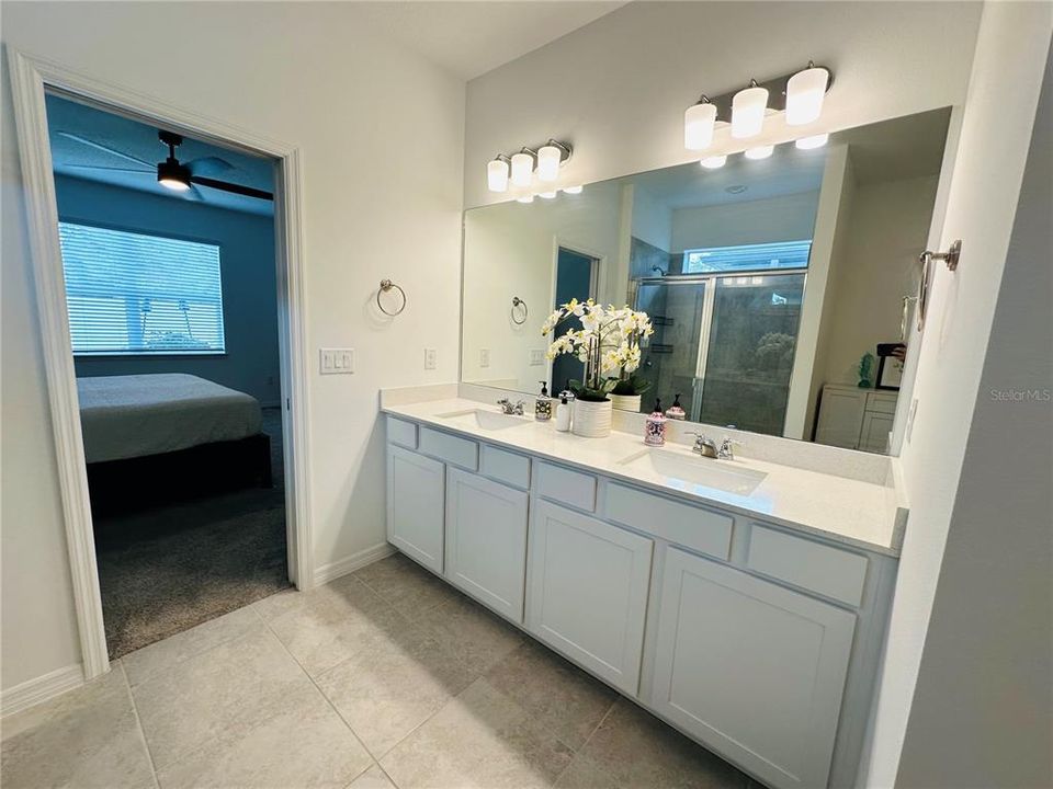 Master Bathroom with double sink and walk in shower