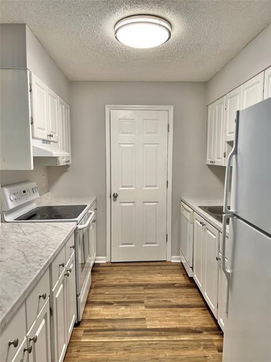 The kitchen has a newer light fixture, and is light & bright!