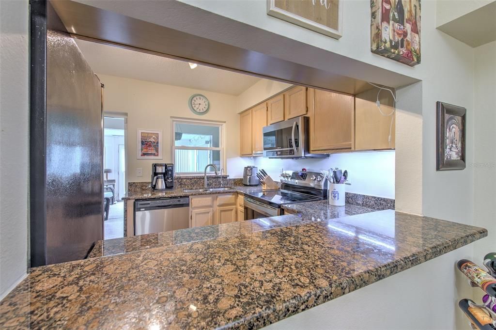 Kitchen with Stainless Steel Appliances and granite countertops