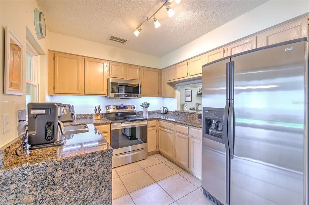 Kitchen with Stainless Steel Appliances and granite countertops