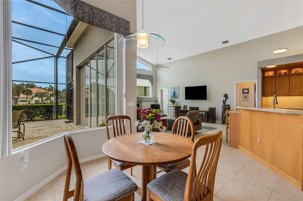 Eat-in kitchen with unobstructed view of the lanai and pond!