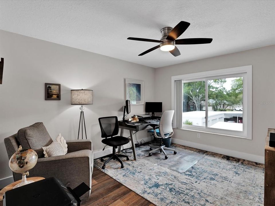 Guest bedroom is spacious w/ abundant natural lighting