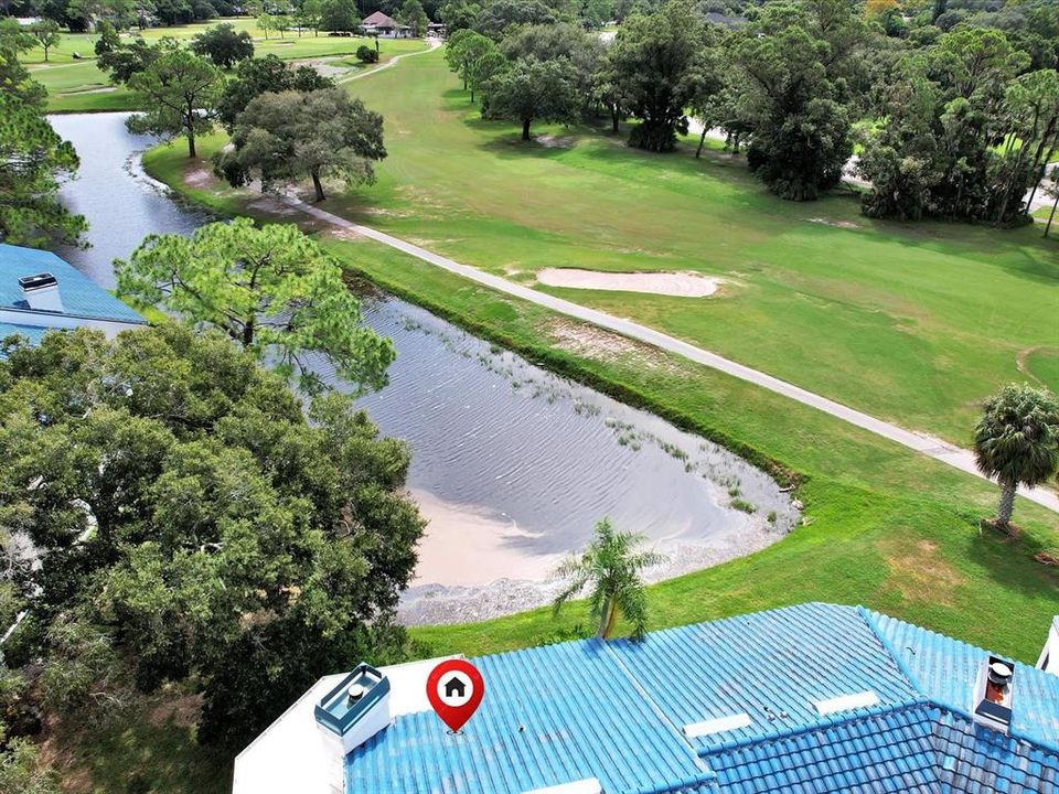 This unit sits on the first hole of the Lansbrook Golf Course overlooking the fairway and green