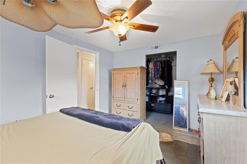 Owners Bedroom featuring a walk-in closet.