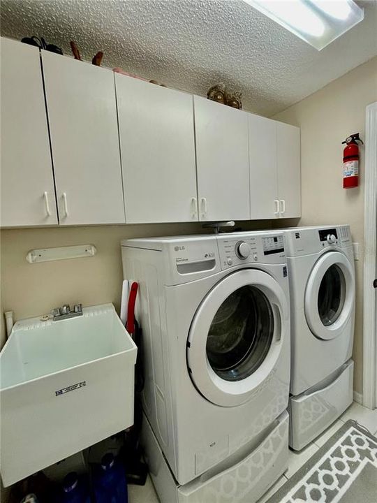 laundry room with large washer and dryer