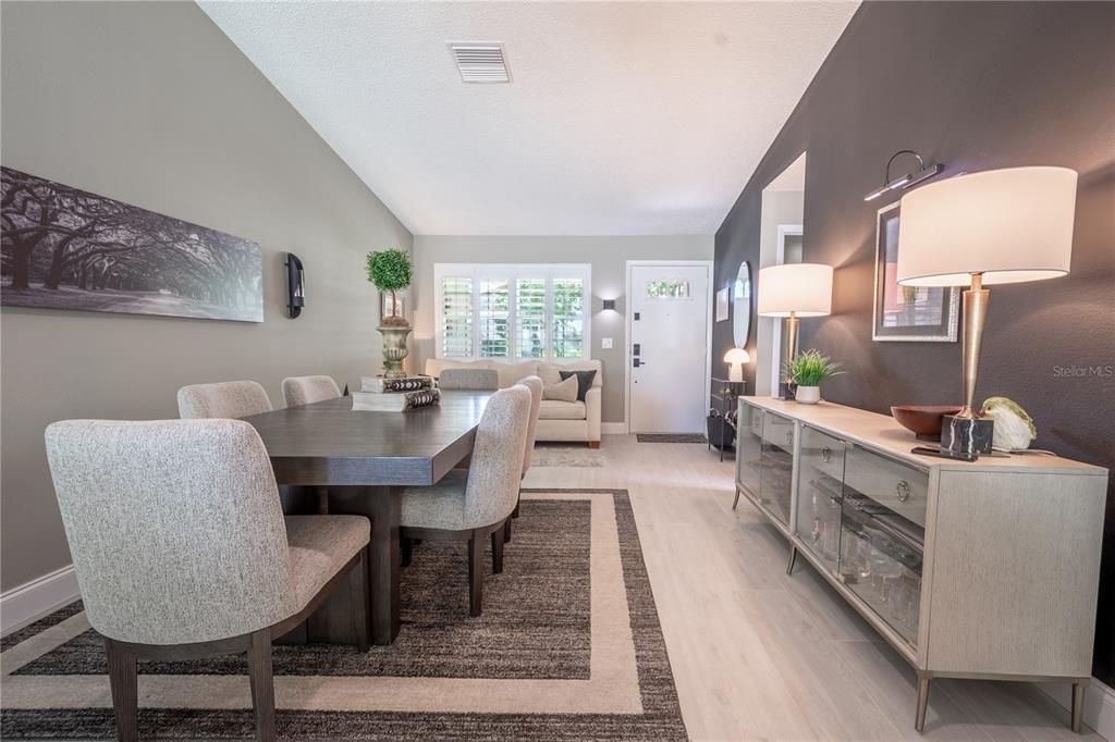 The dining room sits beneath the vaulted ceiling ideal for formal entertaining as well as weeknight casual dinners.