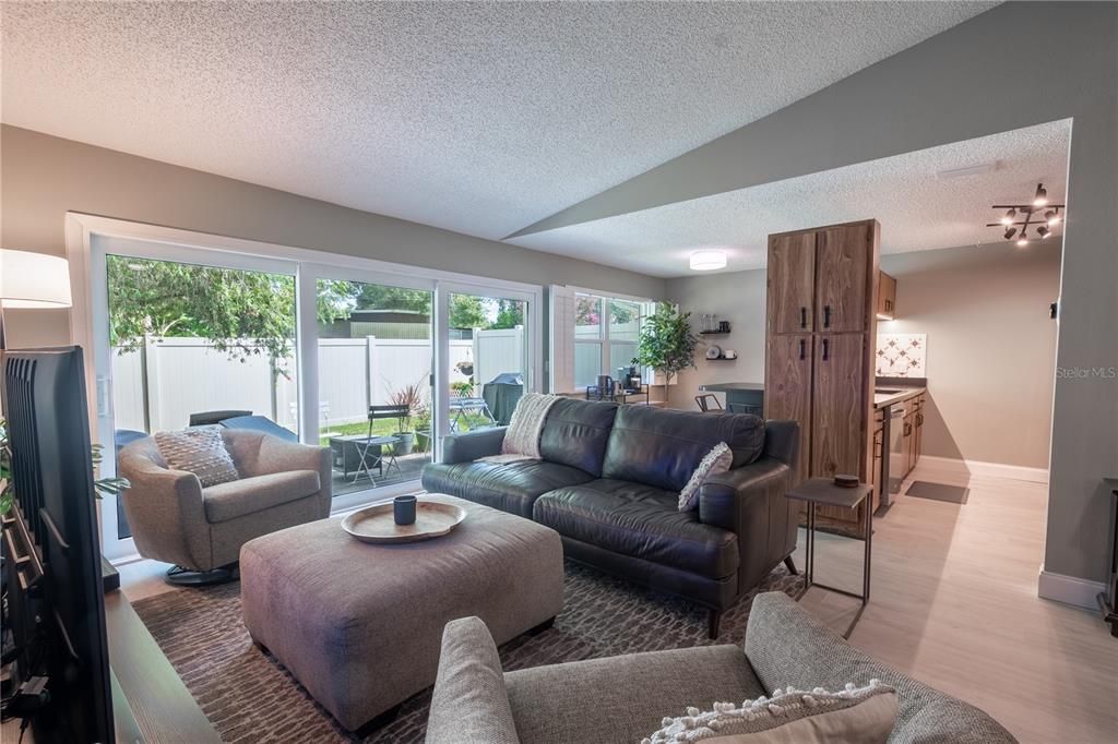 The living room is open to the kitchen and breakfast area.