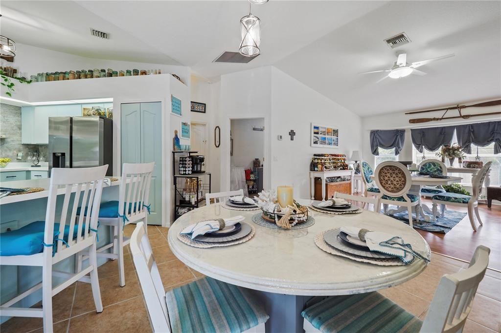 View of kitchen, kitchen nook, utility room and dining area