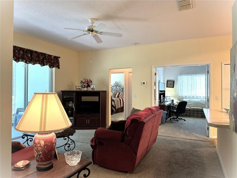 Family room with view into den/3rd bedroom