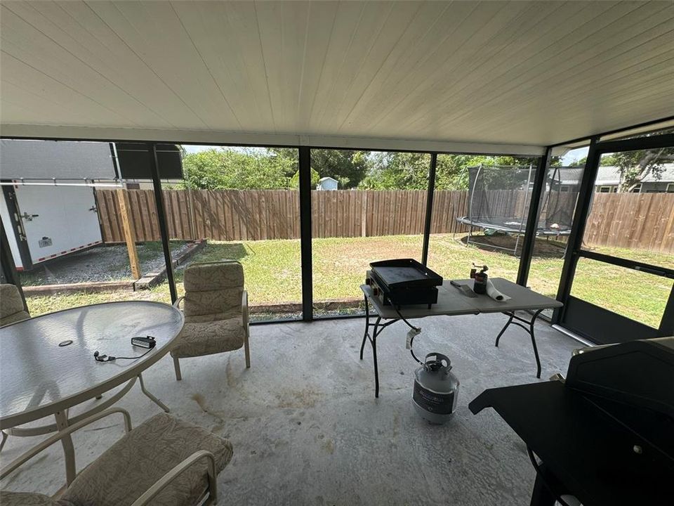 Covered screen back porch.