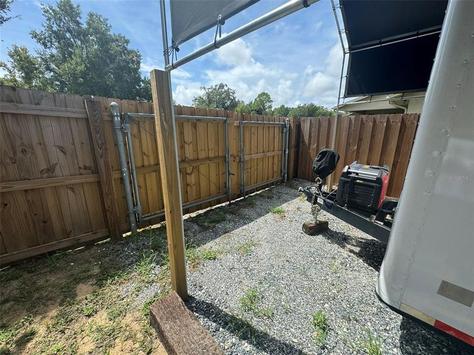 Double gate entry off side road.