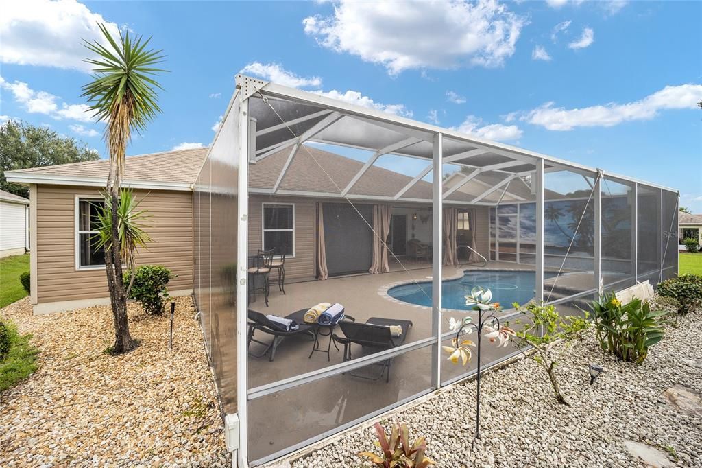 Rock mulch around Pool cage