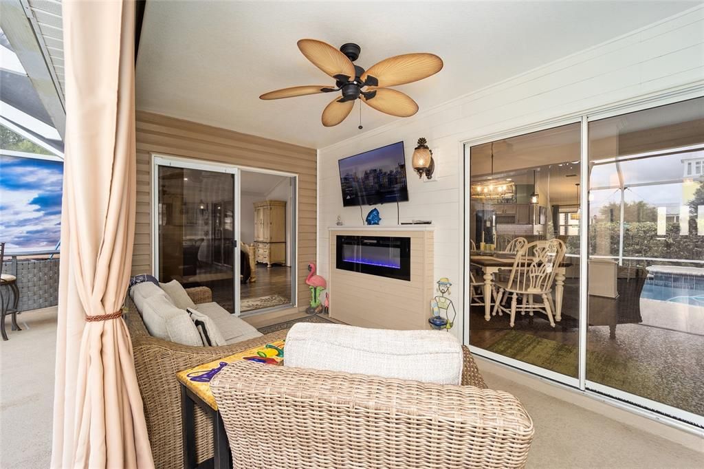 Covered Lanai with Privacy Shades & Curtains (Fireplace does not convey)