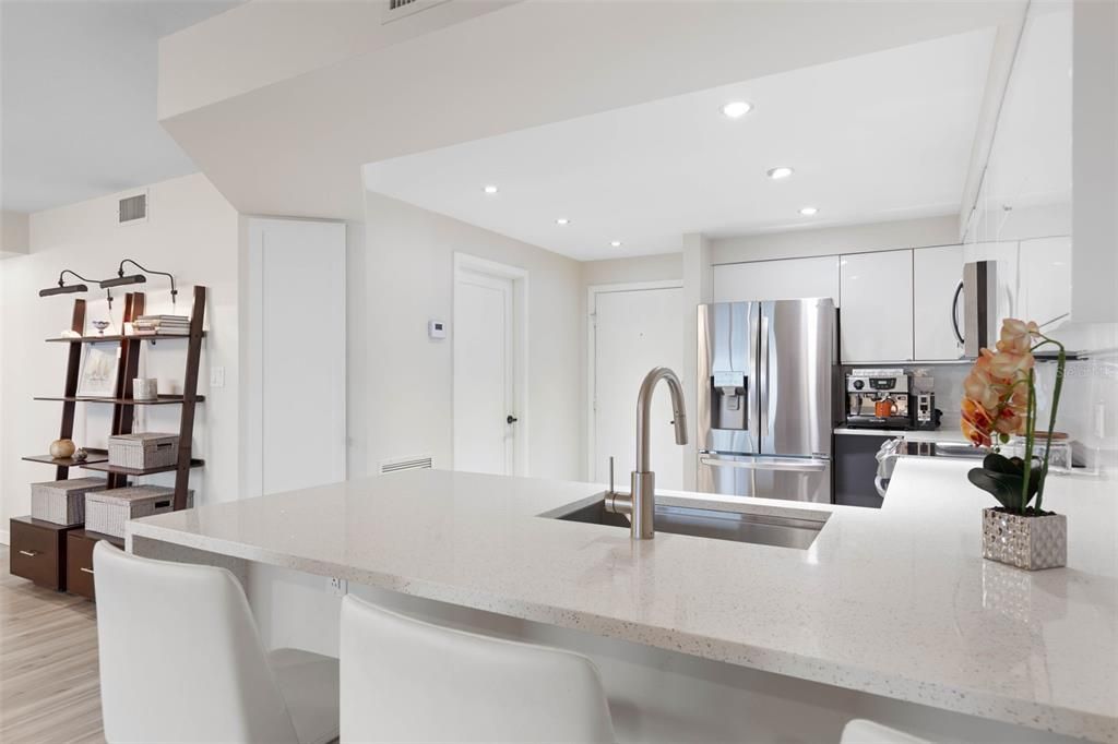 Gorgeous quartz countertops provide the perfect breakfast spot