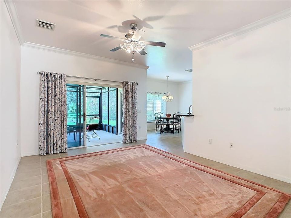 GREAT ROOM WITH SLIDING DOORS TO LANAI - OPEN TO KITCHEN AND DINING