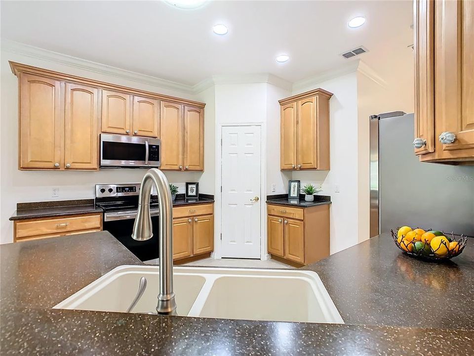 42” CABINETS, SOLID SURFACE COUNTERS, WALK-IN PANTRY