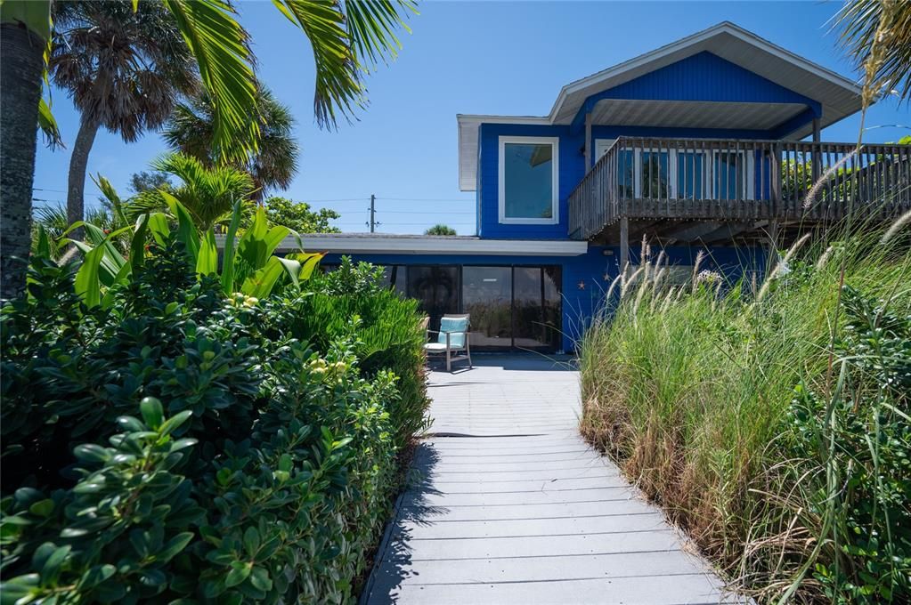 Pathway leading to the home from the beach