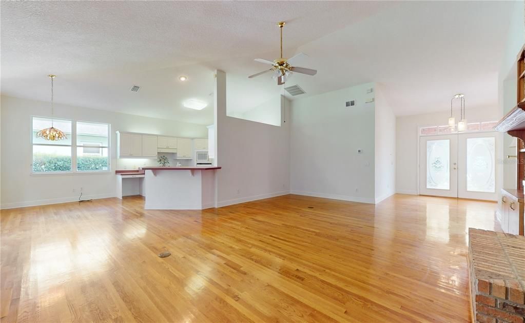 FLYER, LIVING ROOM, AND OPEN KITCHEN VIEWS.