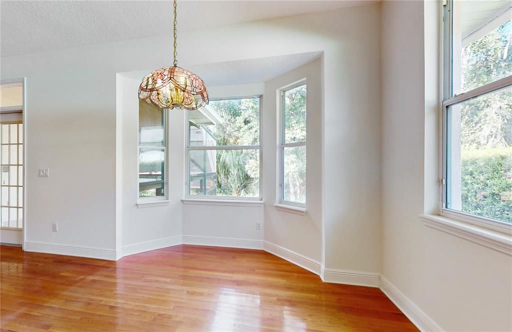 DINING ROOM WITH BAY WINDOW