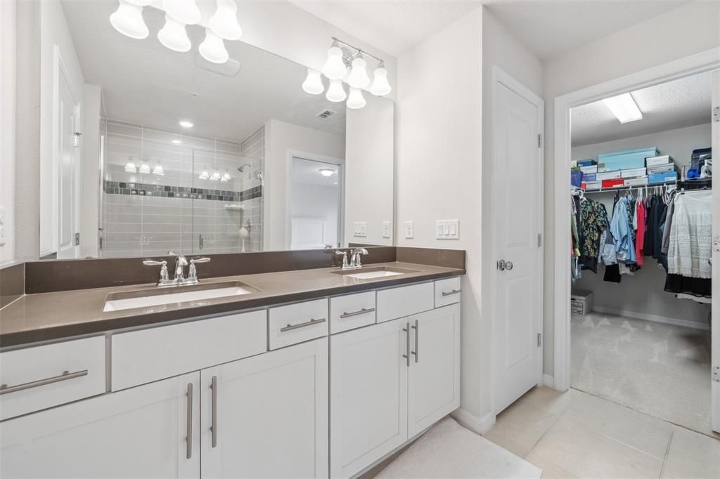 Grand walk-in closet in the primary bathroom