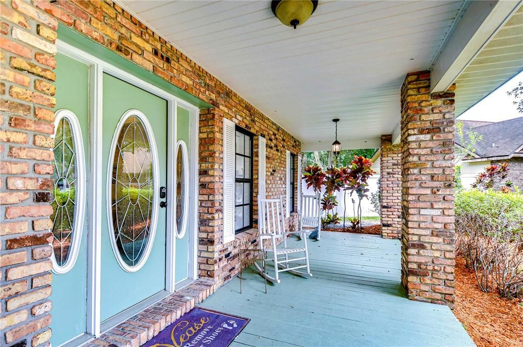 Covered front porch welcomes you!