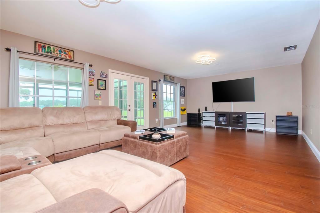 Livingroom w/ Wood Floors and Great Lake Views