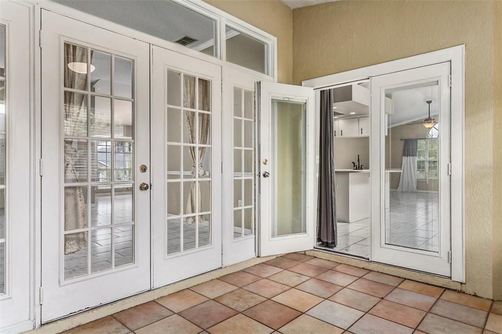 Sunroom w/entry from the living room, primary bedroom, and dinette