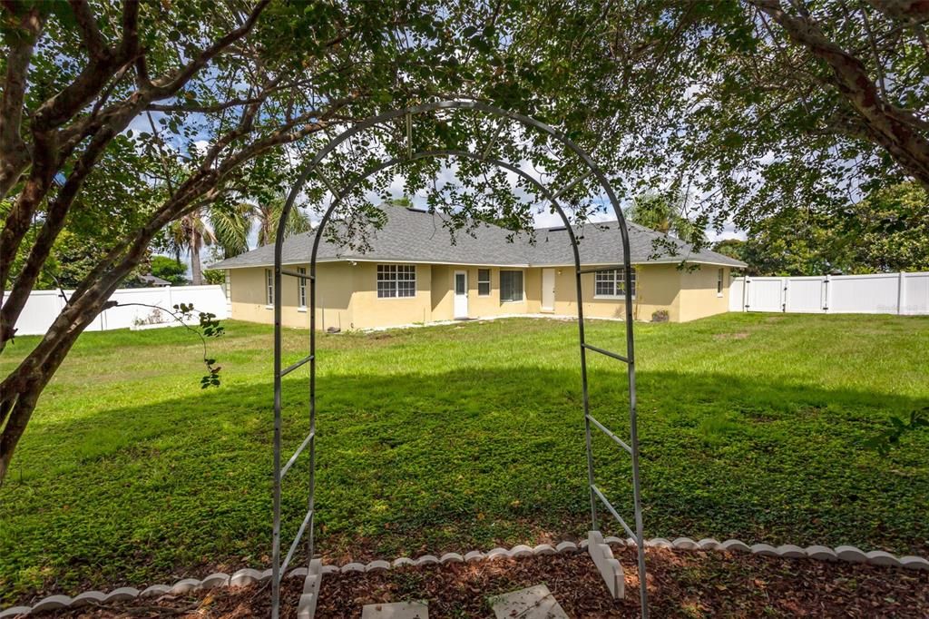 Rear view of home from backyard