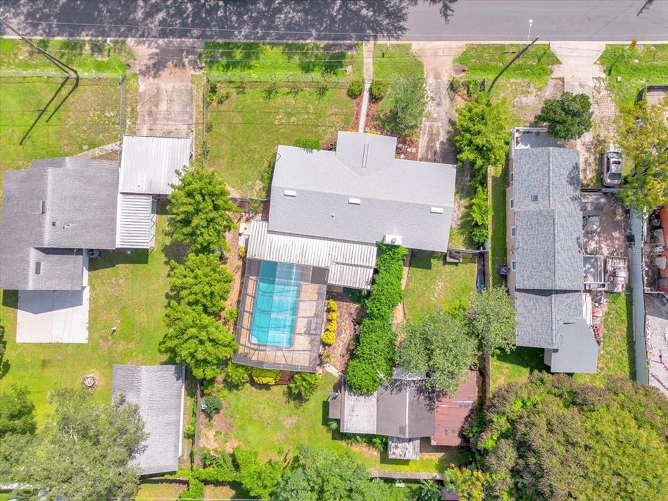 Aerial view of double lot with guest cottage in back.