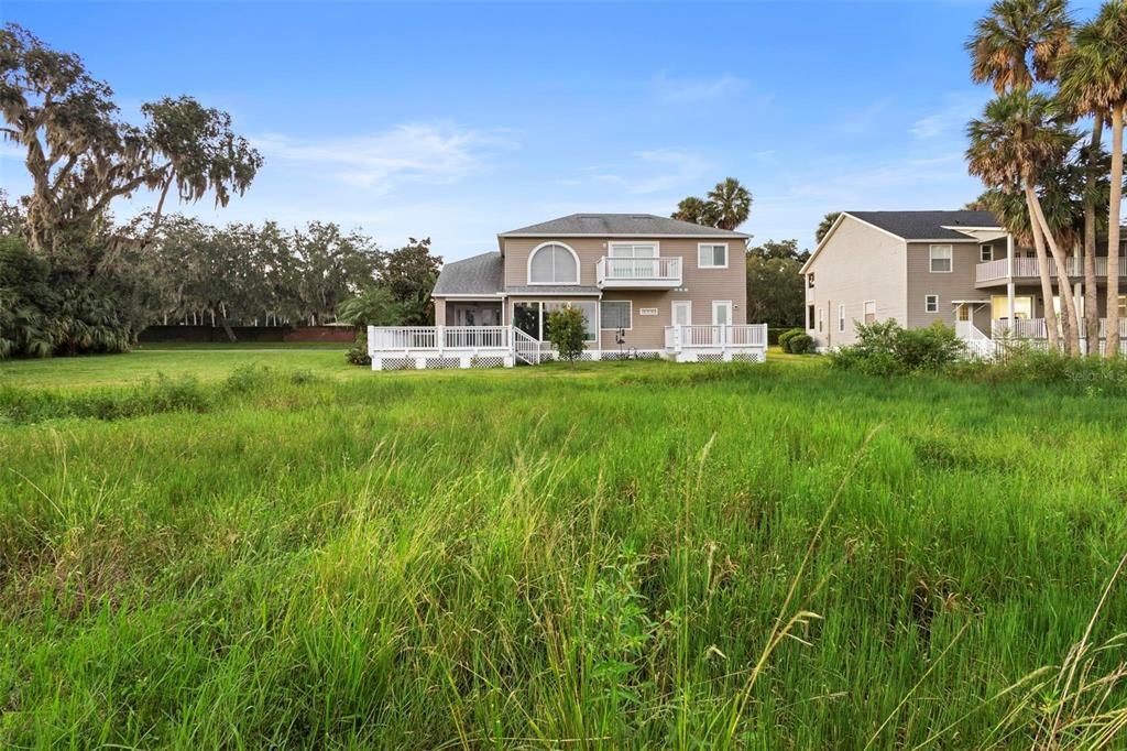 REAR VIEW OF THIS FABULOUS HOUSE WITH 3 DECKS