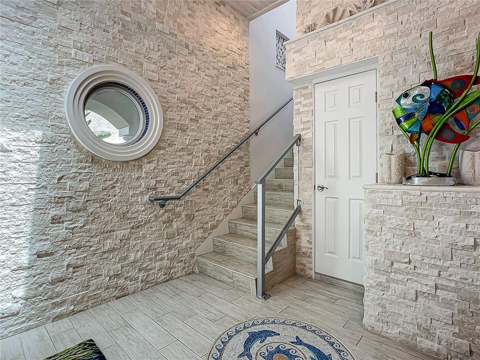 Foyer and Staircase to upstairs Primary Suite