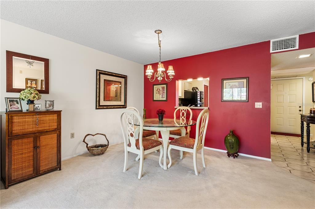 Great room featuring sliding glass doors to the screened-in lanai