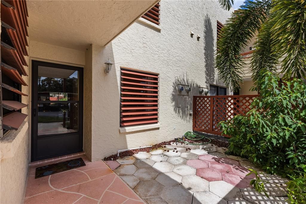 Front elevation showing the entry way and courtyard.