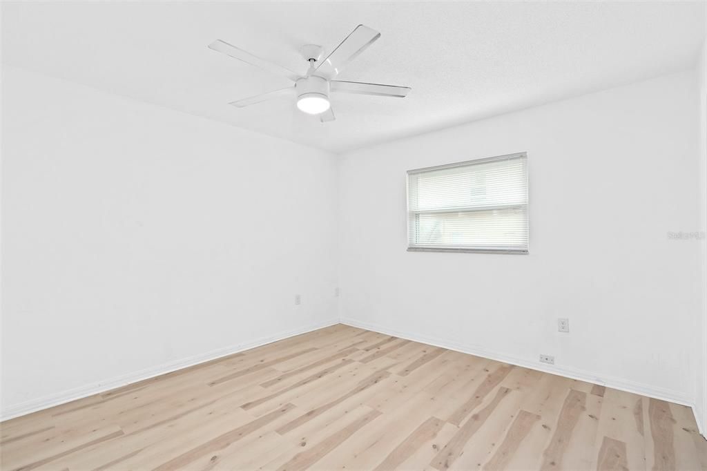 Unit 528 Broadway Primary bedroom with luxury vinyl flooring